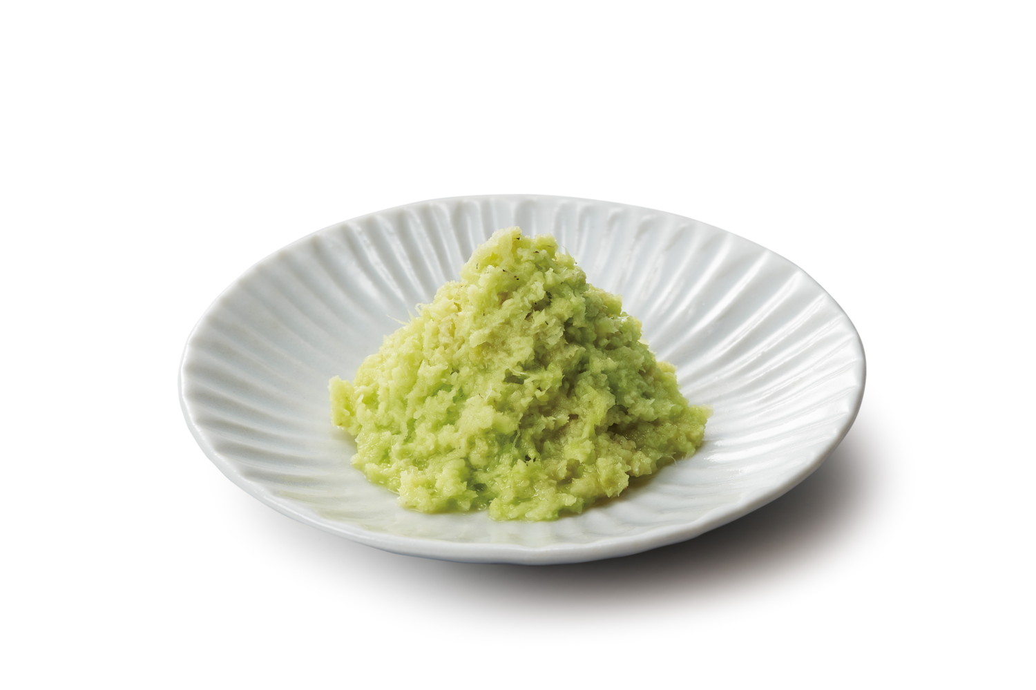 山型に盛られた小皿の上のわさび
